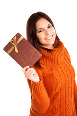 Fototapeta premium Beautiful woman holding a gift