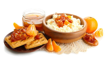 cottage cheese in bowl with homemade tangerine jam, isolated