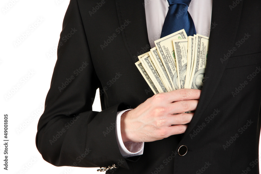 Wall mural business man hiding money in pocket isolated on white