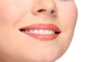 Woman smiling with teeth isolated on white background