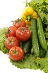 Fototapeta na wymiar Green cucumber and tomatoes