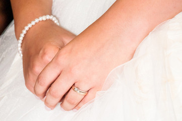 Hands of a young bride