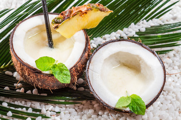 Pinacolada drink with milk in the fresh coconut