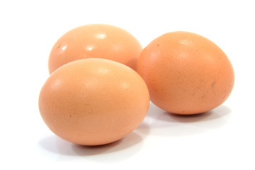 three eggs isolated on white background