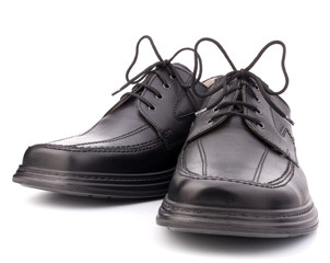 Black glossy man&rsquo;s shoes with shoelaces