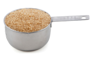 Demerera sugar presented in an American metal cup measure