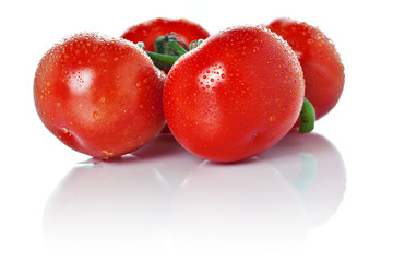 Closeup of vine tomatoes isolated on white