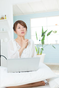 Beauty asian woman using a laptop computer