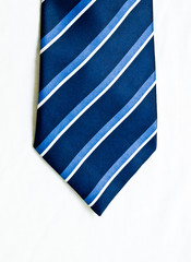 Striped blue and white tie isolated on white background.