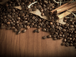 coffee beans with cinnamon sticks