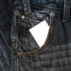 blank white card in a pocket jeans