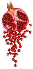 Cut the pomegranate with scattered grain top view