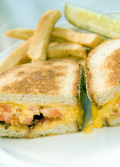 grilled cheese sandwich bacon tomato with french fries potatoes