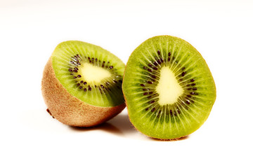 Fototapeta premium Halved Kiwi Fruit on white backdrop