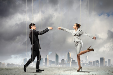 Puppet businesspeople