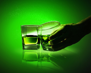 Two glasses of green absinth