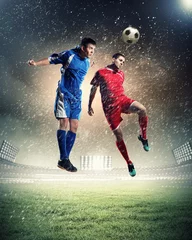 Foto op Plexiglas twee voetballers die de bal raken © Sergey Nivens