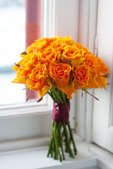 orange rose wedding bouquet
