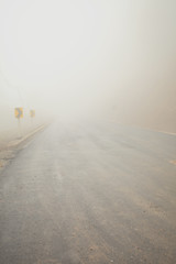 road have fog way uphill mountain