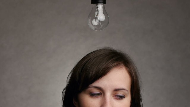 symbolic light bulb idea over head