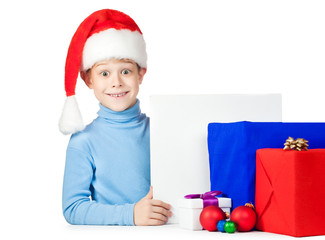 cute kid with a lot of Christmas gifts