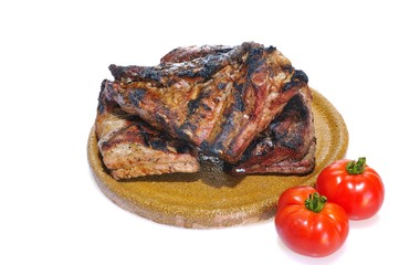 Pork ribs and tomatoes.