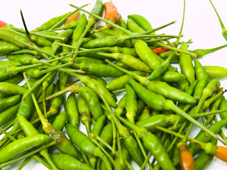Green birds eye chillies pile from Thailand