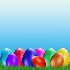 Easter background. Easter eggs laying in green grass