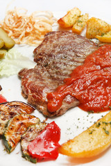 Grilled steak with vegetables