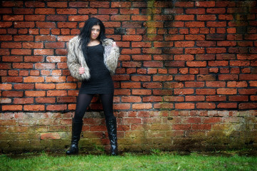 Cute young dark haired female outdoors