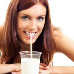 Beautiful woman drinking milk, over white