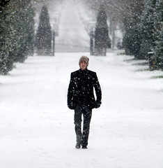 Young good looking male outdoors in snow