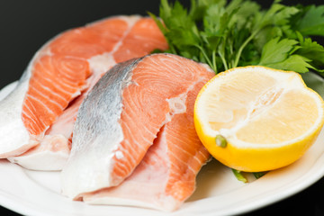 Uncooked salmon on plate