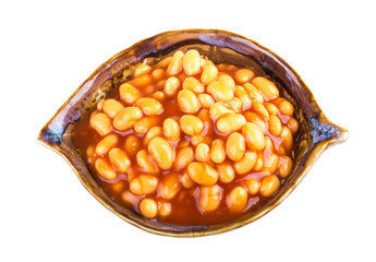 Marinated haricot beans in tomato sauce with shallots on a plate