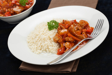 Schweinefleisch süß-sauer mit Reis