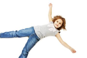 Happy curly girl lying on floor on white background