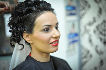 Beautiful caucasian bride getting ready for the wedding ceremony