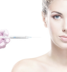 Portrait of young woman receiving cosmetic injection procedure