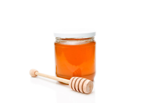 Honey with wood stick