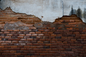 cracked concrete old brick wall