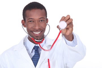 Physician holding up a stethoscope