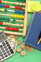 Bright wooden abacus and calculator. Conceptual photo of old