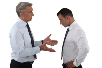 Boss and employee having a serious discussion