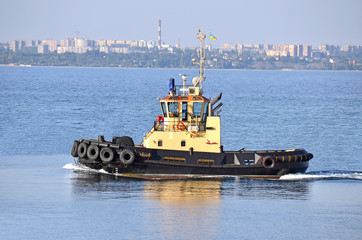 Tugboat in harbor quayside on Odessa, Ukraine