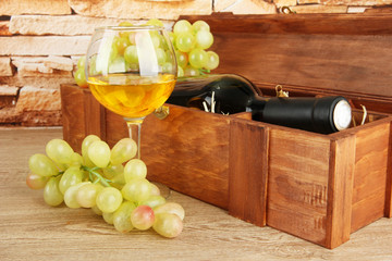 Obraz premium composition of wine,box and grapes