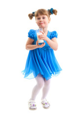 Smiling girl with a glass of milk