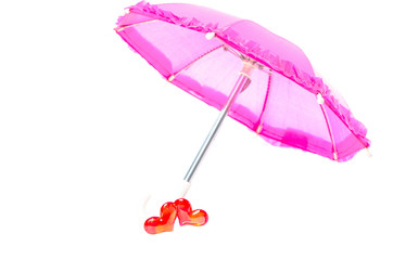 Pretty pink parasol with two hearts