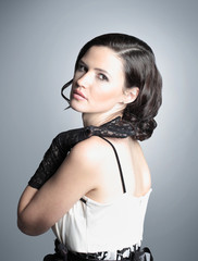Fototapeta premium Fashion portrait of a young beautiful dark-haired