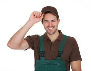 Happy young gardener in dungarees