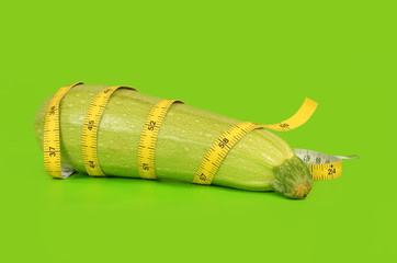 Zucchini wrapped with a measuring tape